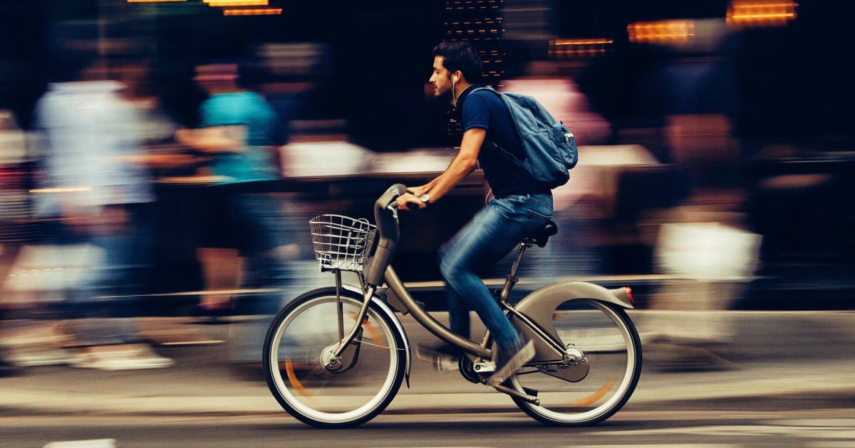 https://www.pexels.com/photo/man-riding-bicycle-on-city-street-310983/