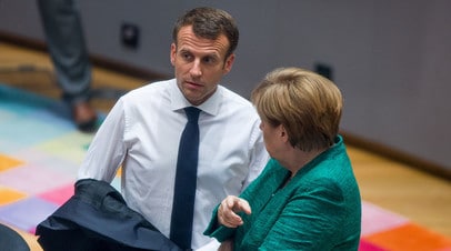 Французский президент Эммануэль Макрон и канцлер Германии Ангела Меркель. Брюссель, Бельгия, 28 июня 2018