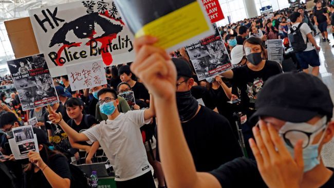 Общество: Гонконг ждет очередное жаркое лето: новый закон, новые демонстрации