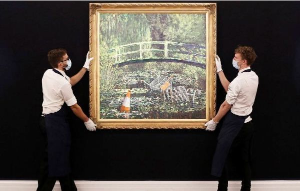 Общество: Картина Бэнкси продана на аукционе в Лондоне почти за 10 миллионов долларов